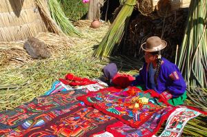 Young Uros girl selling her crafts